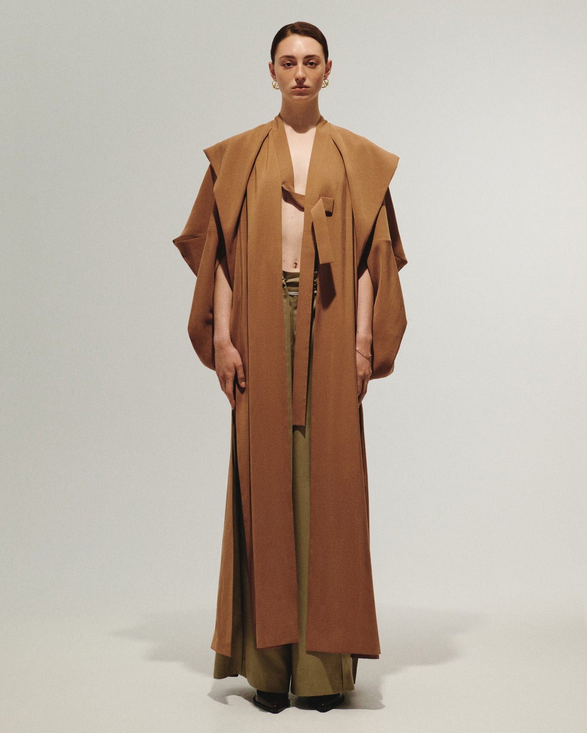 Trench coat with designer sleeves